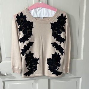 Beautiful tan wool sweater with black lace detail by Diane von Fürstenberg